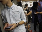 In Asia's trend-setting cities, iPhone fatigue sets in